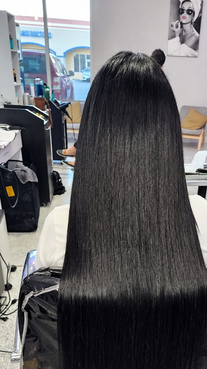 After: long, sleek black hair extensions