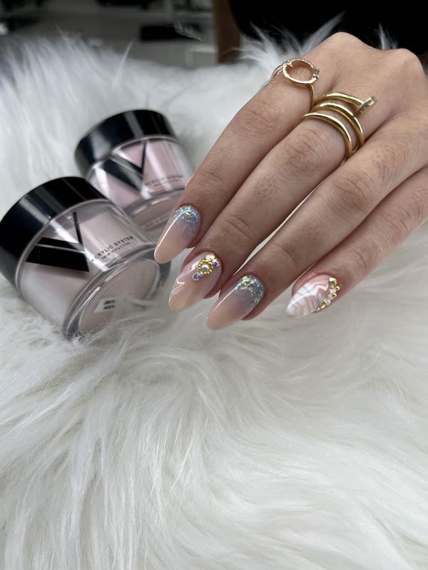 Almond nails with gold and crystal details